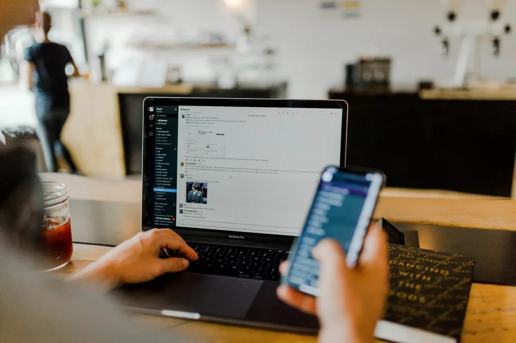 Photo of phone and mobile with Slack